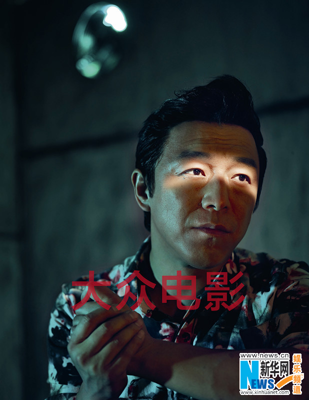 L'acteur chinois Huang Bo pose pour un magazine 