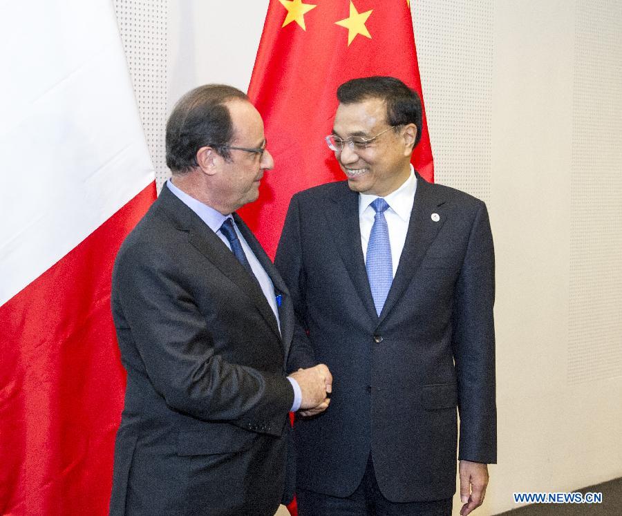 Le Premier ministre chinois et le président fran?ais s'entretiennent de l'approfondissement des relations bilatérales