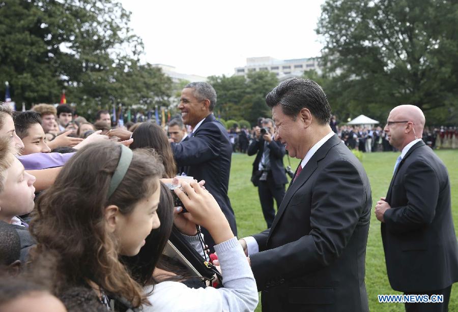 Début des entretiens entre MM. Xi et Obama à la Maison Blanche