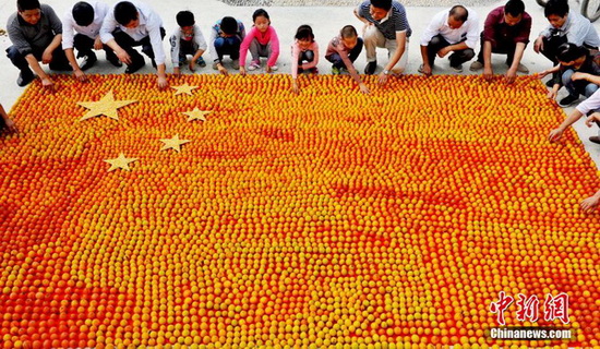 Un drapeau chinois fait de kakis pour la Fête nationale 