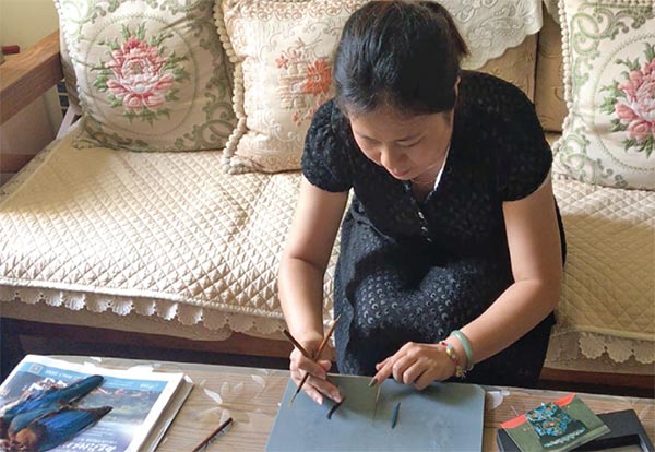 Des plumes de martin-pêcheur dans la joaillerie impériale chinoise