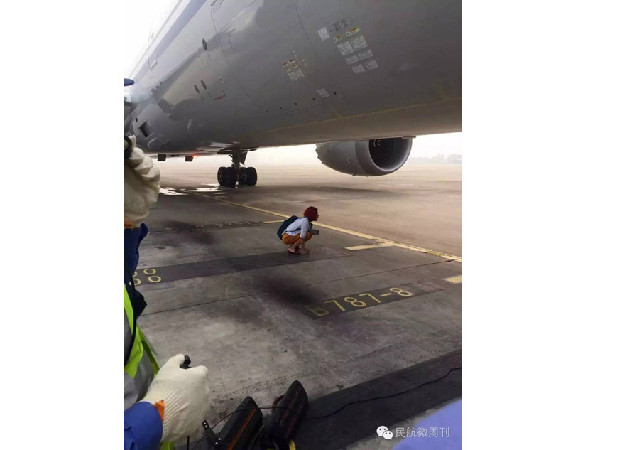 Un couple arrêté après avoir bloqué un avion en s'asseyant sur la piste à l'aéroport de Beijing