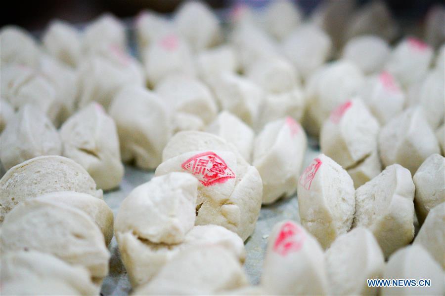 Les fameux petits pains Baoning cuits à la vapeur