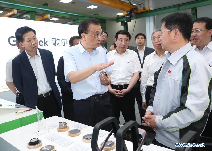 Le Premier ministre chinois met l'accent sur les réductions d'imp?ts et de frais, et l'amélioration des services financiers