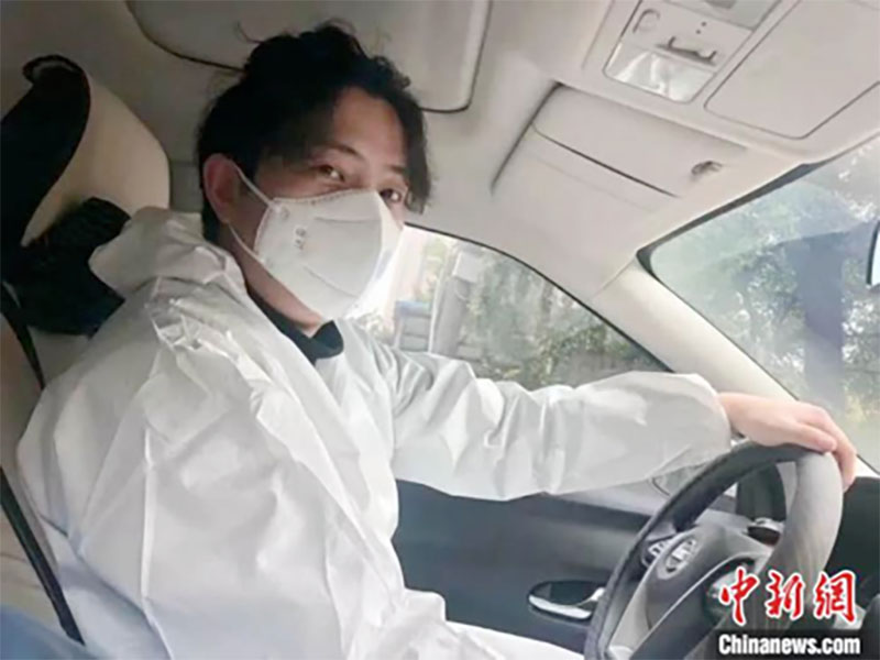 En photo : des bénévoles à Wuhan