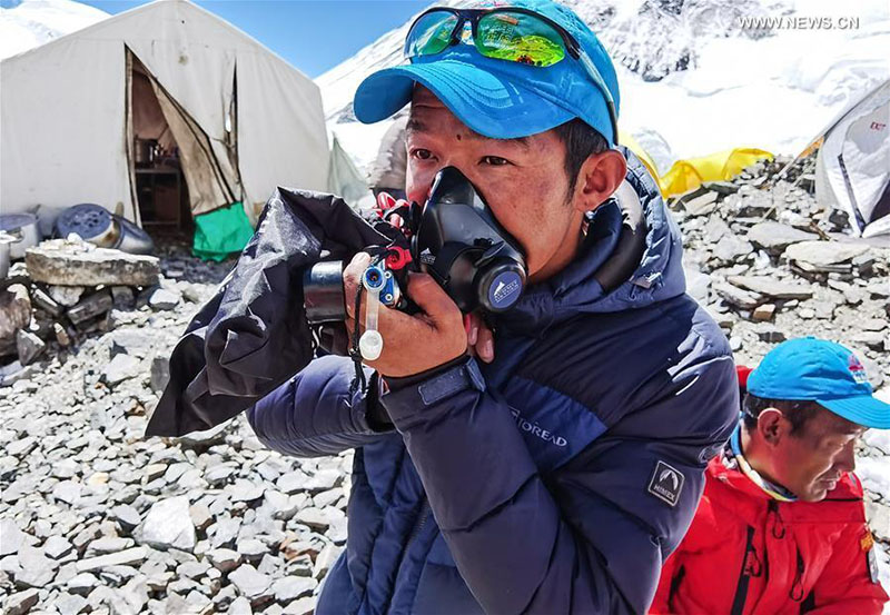 L'équipe de remesurage annonce une liste de 12 personnes qui monteront jusqu'au sommet du mont Qomolangma