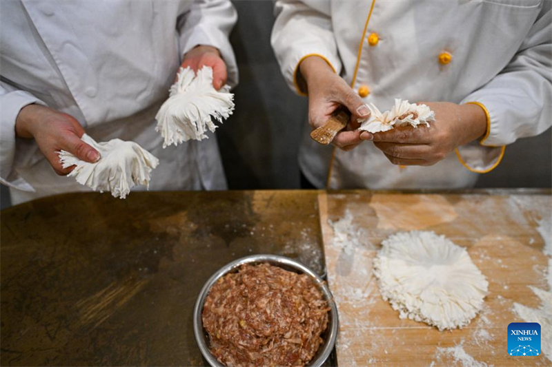 Histoire en photos d'une députée servant les gens avec passion et dévouement en tant que chef spécialiste des Shaomai