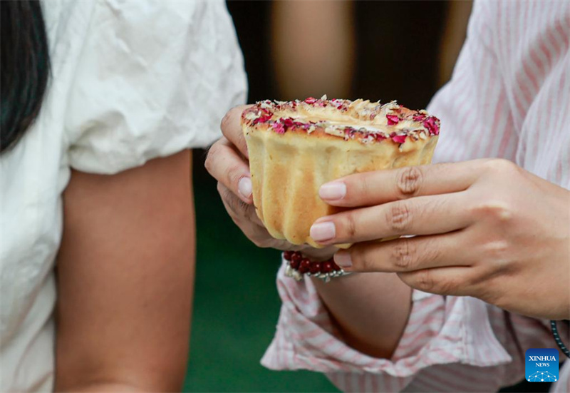 Xinjiang?: les techniques traditionnelles de fabrication du naan transmises et développées à Kuqa